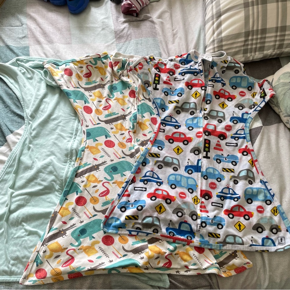Bundle of zipadee zip sleep swaddles
